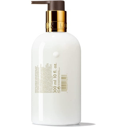 Loțiune de corp Molton Brown Merry Berries și Mimosa, roz