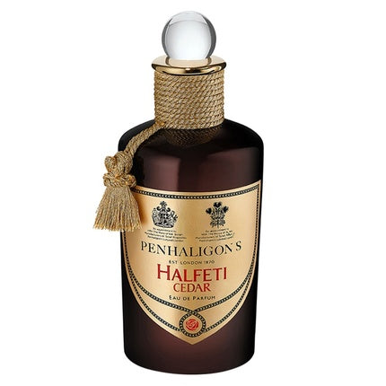 Eau de Parfum Penhaligon's London Halfeti Cedar, arome lemnoase, sticlă maro închis, capac cu sfoară și pompon
