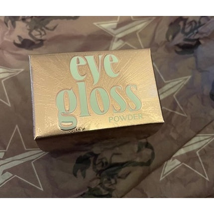 Pudră pentru ochi Jeffree Star Cosmetics - Stardust Champagne, ambalaj auriu, textură irizată