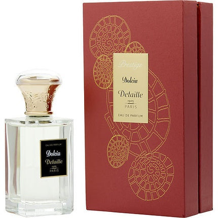 Eau de Parfum Detaille Dolecia, sticlă transparentă, capac auriu, ambalaj roșu